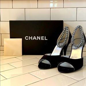 Stunning CHANEL heels with silver pearl straps.